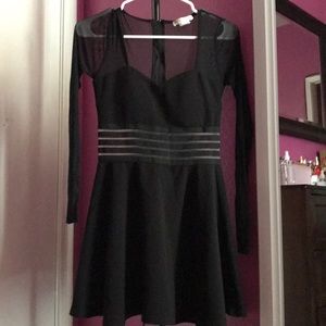 Black dress fits a small as well.